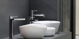 Nowoczesne umywalki Catalano Umywalki z nowoczesnymi kranami na szarej szafce w łazience i w