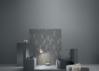 Płytki matowe czy z połyskiem – co wybrać? Płytki matowe w kolorze szarym zastosowane w aranżacji łazienki